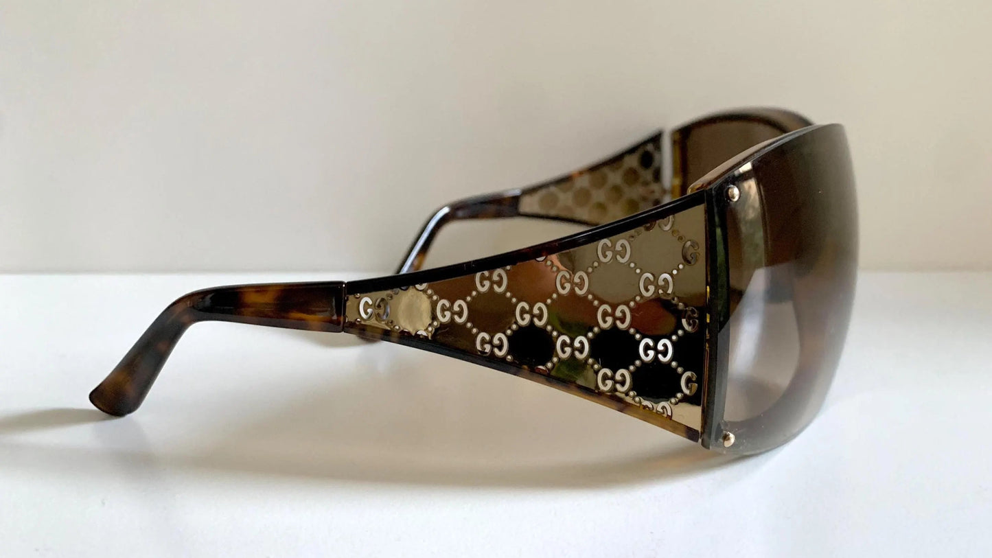 Gucci Vintage-Sonnenbrille aus den 90ern – brauner Wrap-Rahmen mit Strass-Horsebit-Logo