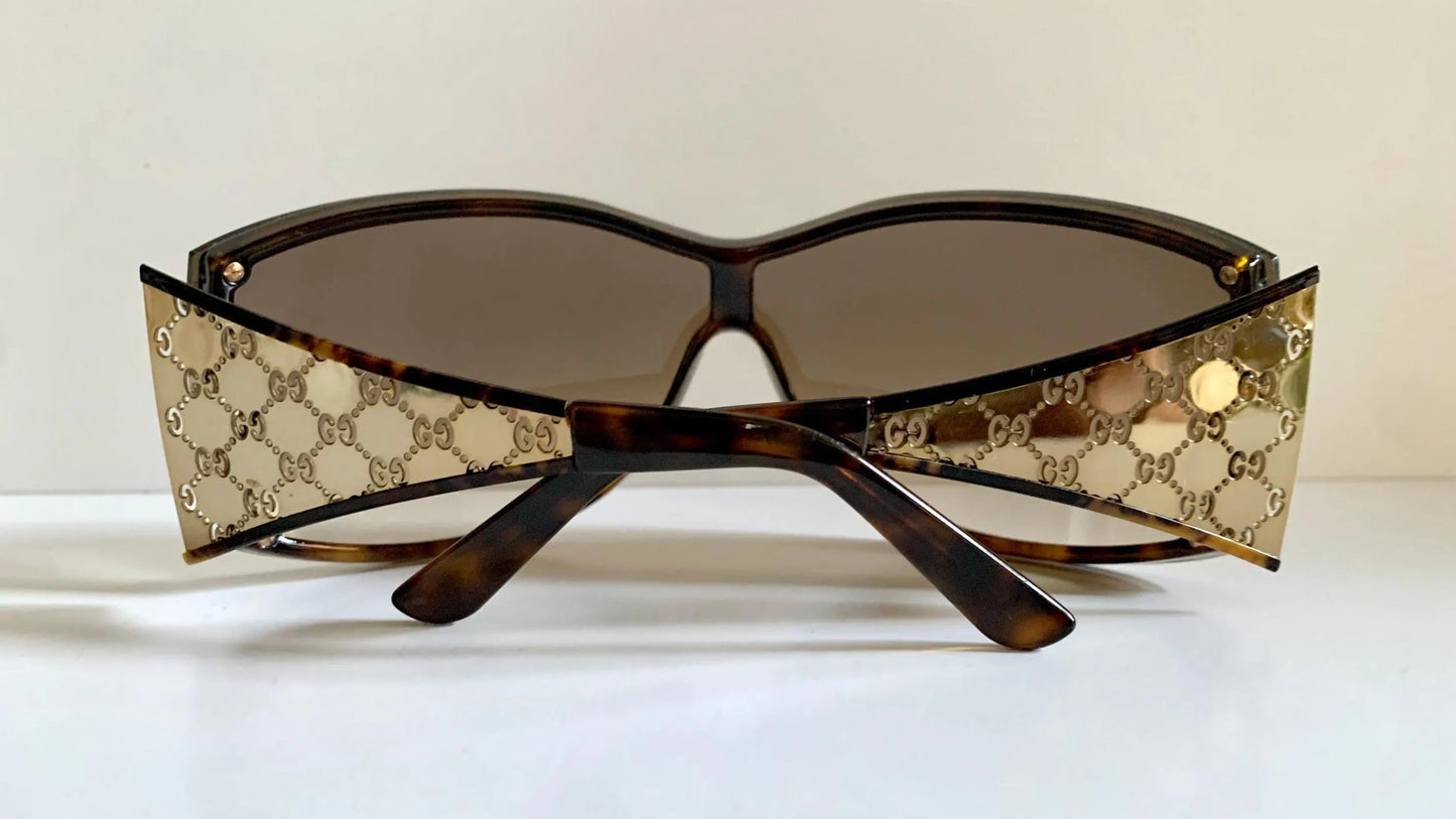 Gucci Vintage-Sonnenbrille aus den 90ern – brauner Wrap-Rahmen mit Strass-Horsebit-Logo