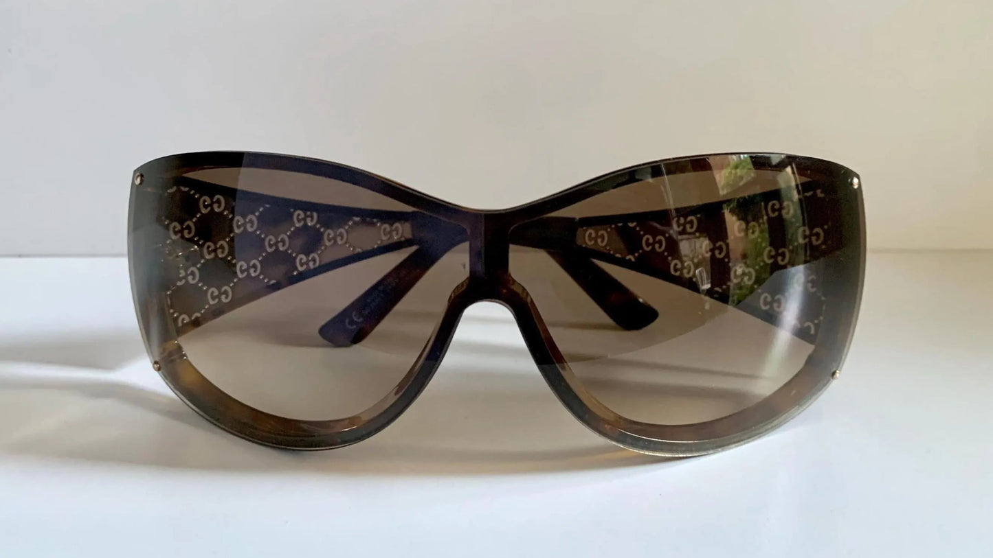 Gucci Vintage-Sonnenbrille aus den 90ern – brauner Wrap-Rahmen mit Strass-Horsebit-Logo