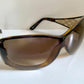 Gucci Vintage-Sonnenbrille aus den 90ern – brauner Wrap-Rahmen mit Strass-Horsebit-Logo