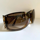 Gucci Vintage-Sonnenbrille aus den 90ern – brauner Wrap-Rahmen mit Strass-Horsebit-Logo