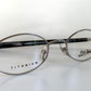 Jean Paul Gaultier 90s vintage glasses - Titanium frame / reversible blue and black temples
